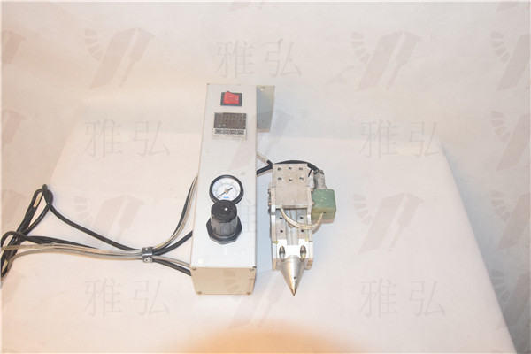 30ml熱熔膠控制器平著放的圖片